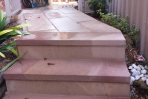 paved path with steps