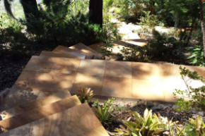 large stone pathway through garden